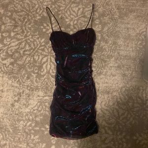 This is a black dress with a blue/ purple undertone/shine to it